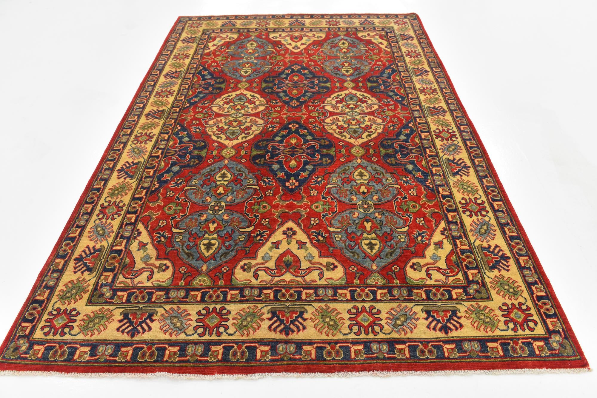 6' x 9' 1 Hand Knotted Kazak Rug