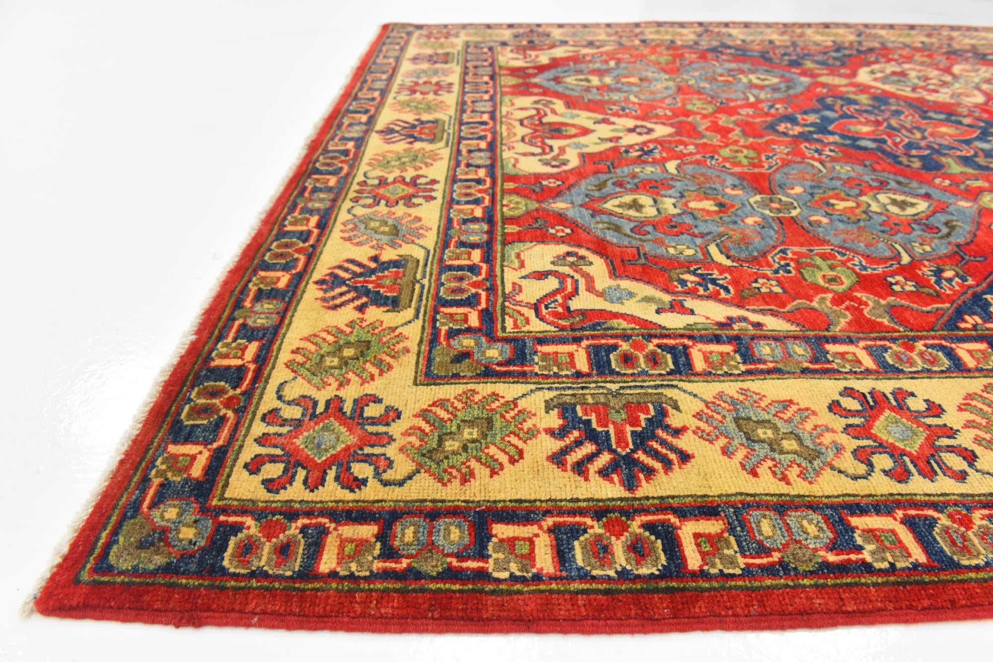 6' x 9' 1 Hand Knotted Kazak Rug