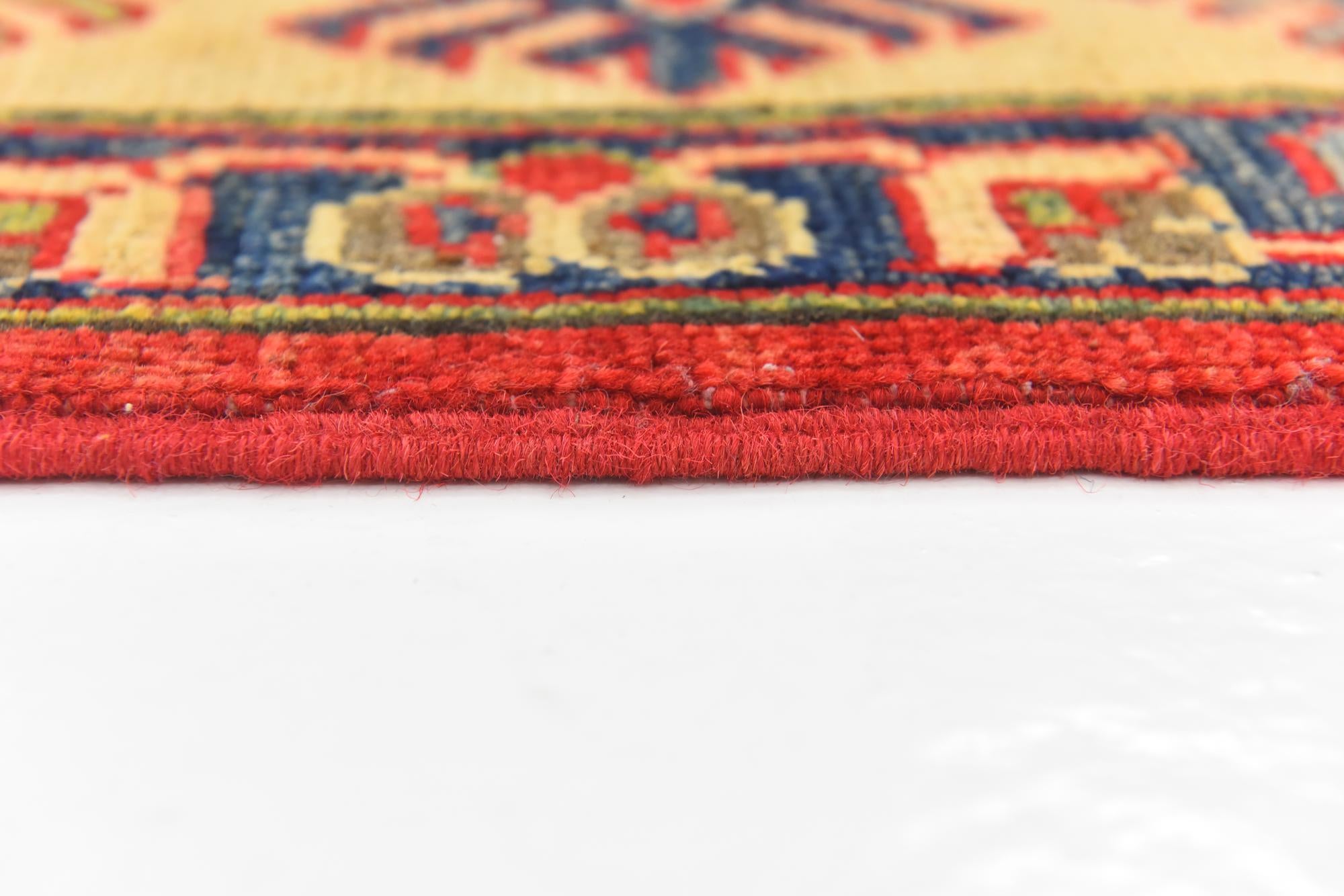 6' x 9' 1 Hand Knotted Kazak Rug