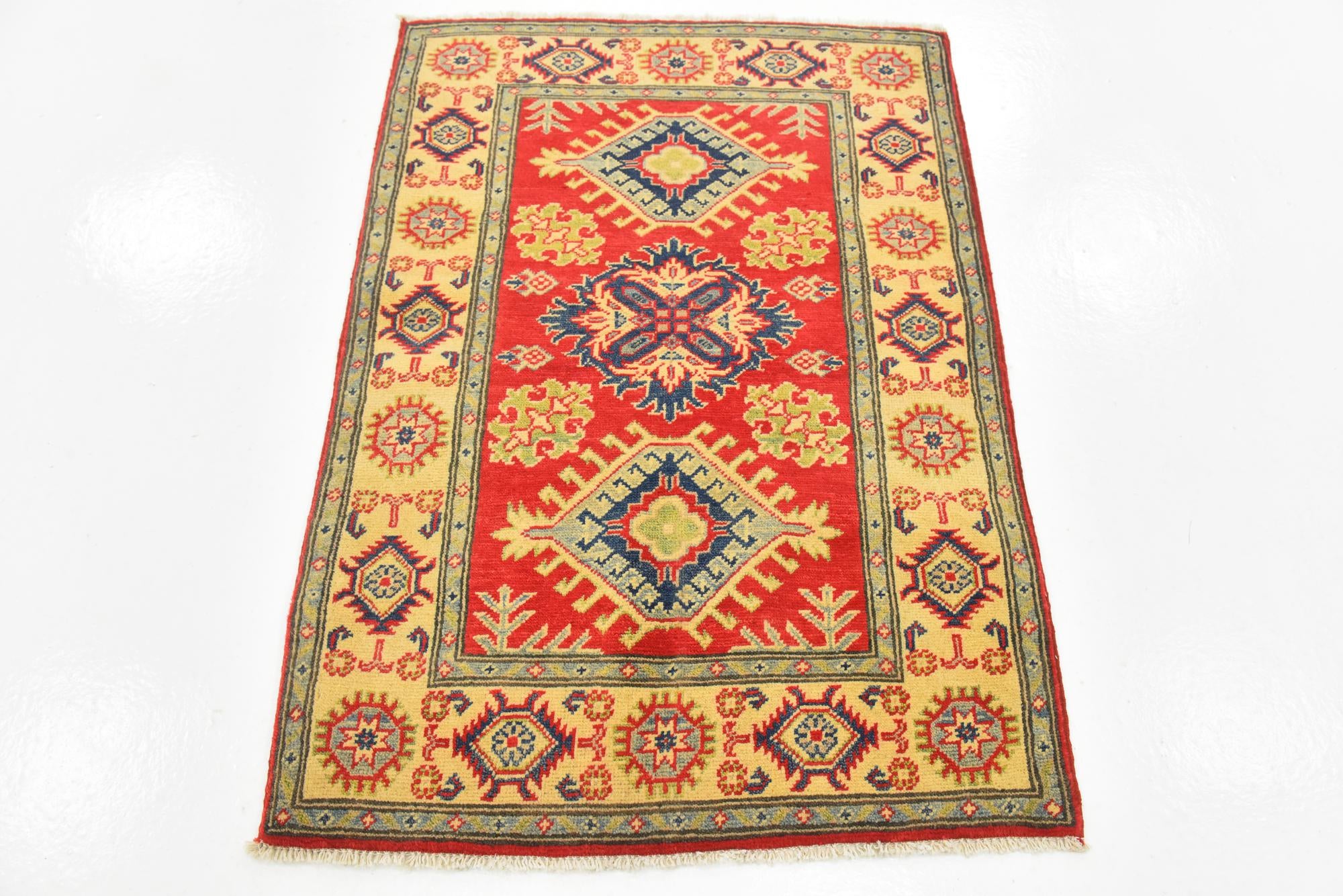 2' 8 x 3' 11 Hand Knotted Kazak Rug