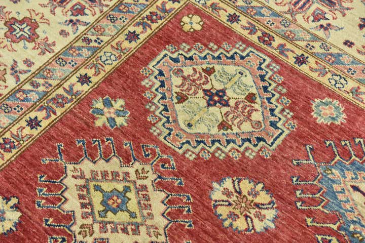 7' x 9' 9 Hand Knotted Kazak Oriental Rug