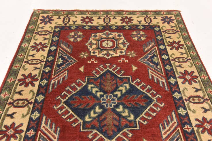 Detailansicht von 80cm x 130cm Handgeknüpft Kazak Teppich