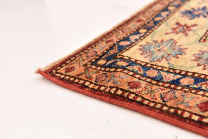 5' 9 x 8' 5 Hand Knotted Kazak Oriental Rug