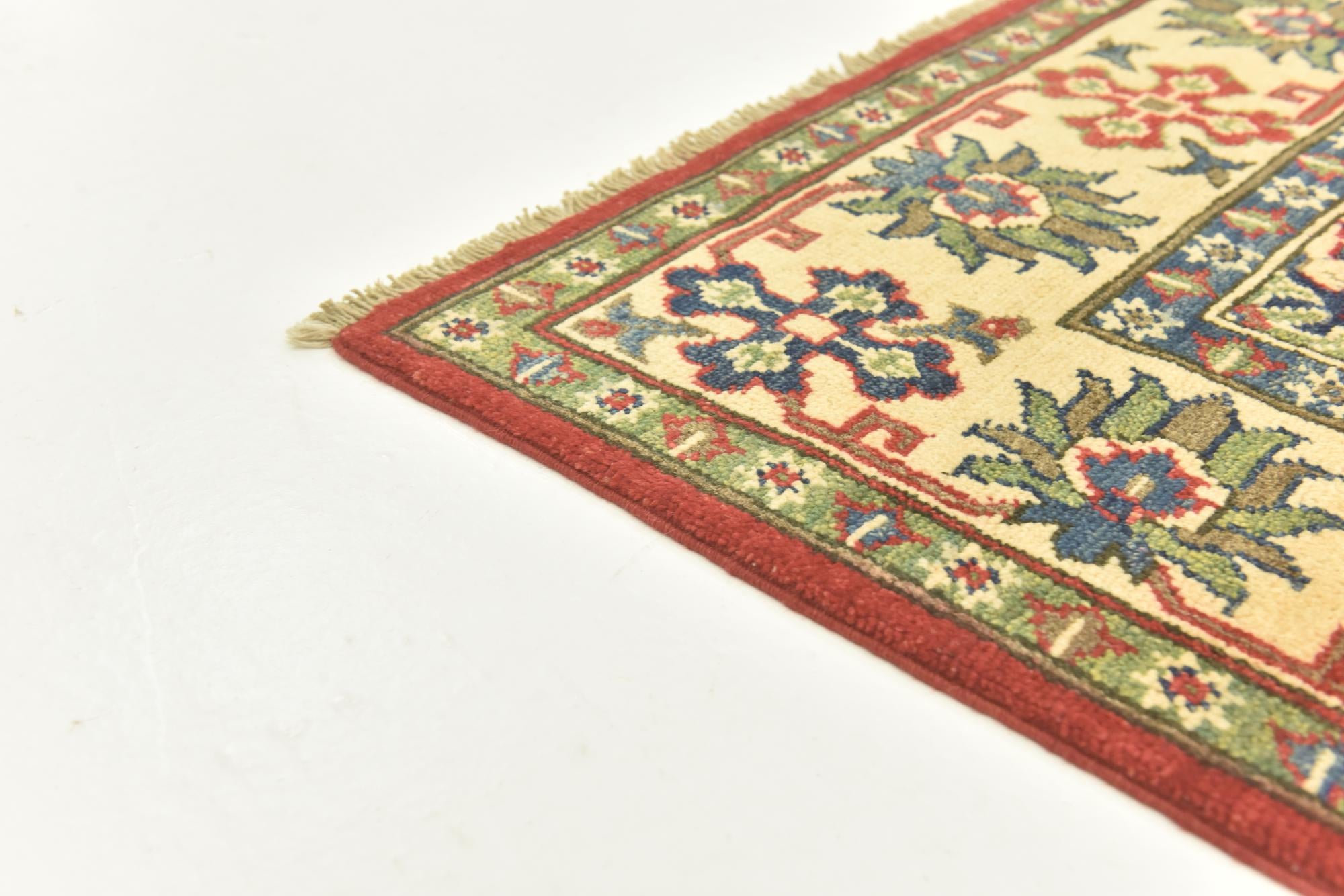 5' x 7' 3 Hand Knotted Kazak Rug