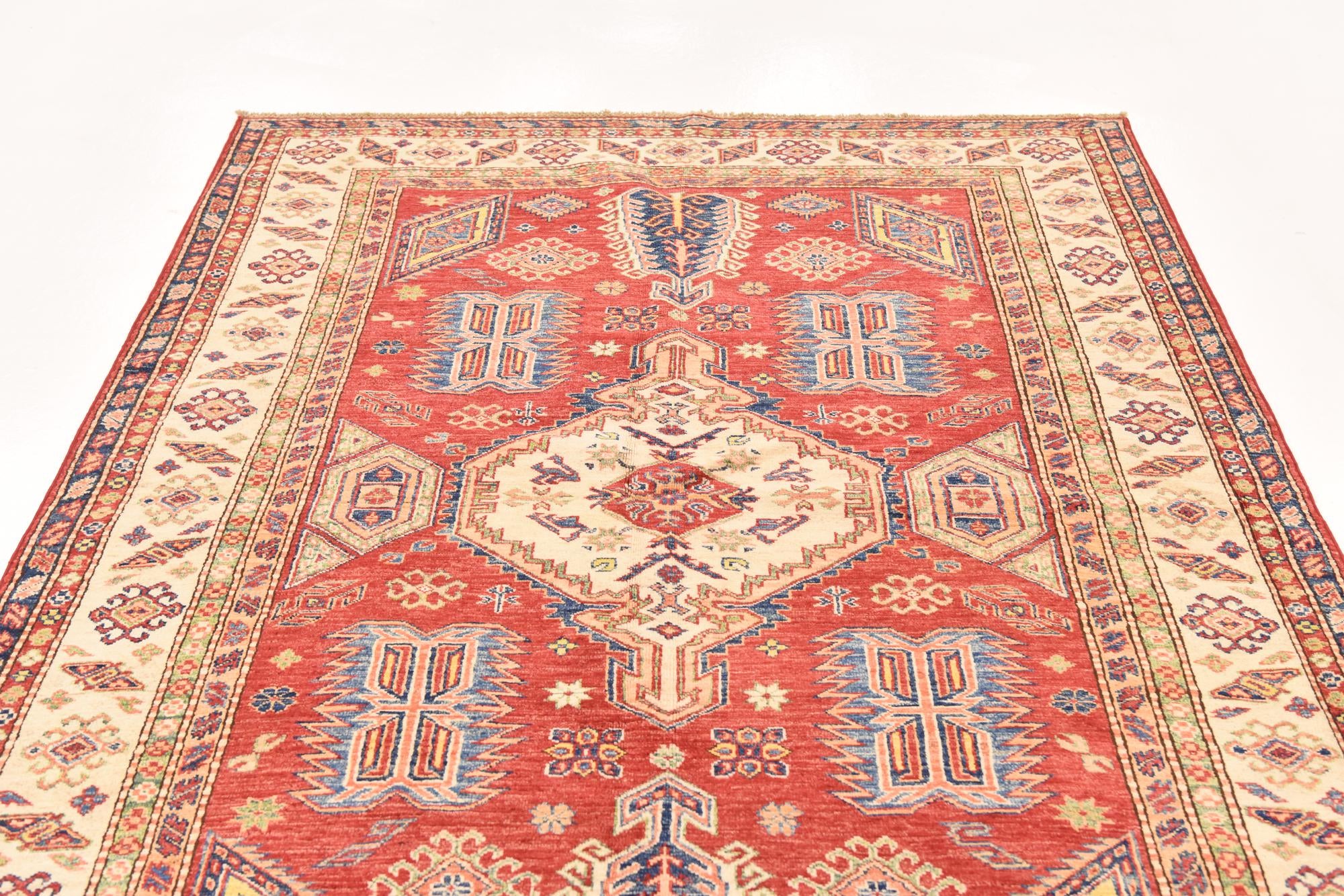 5' 3 x 7' 10 Hand Knotted Kazak Oriental Rug