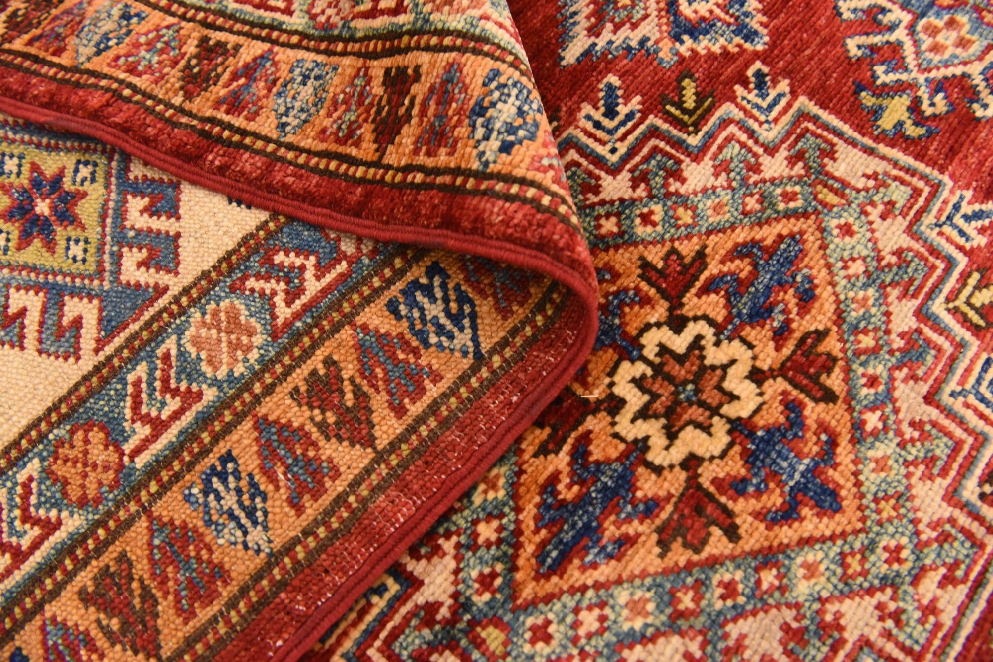 6' x 8' 3 Hand Knotted Kazak Oriental Rug