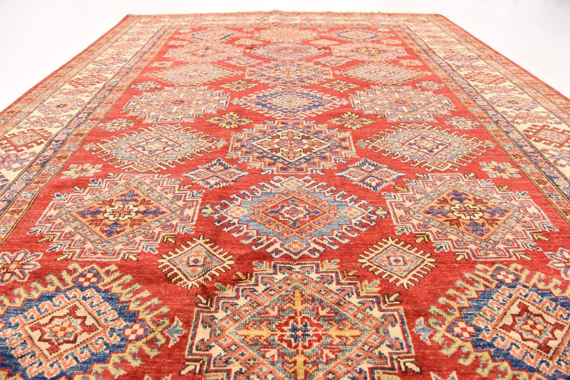6' x 8' 3 Hand Knotted Kazak Oriental Rug