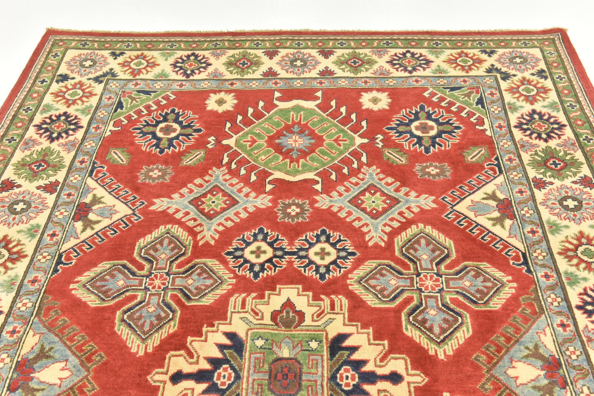5' 10 x 8' 10 Hand Knotted Kazak Rug