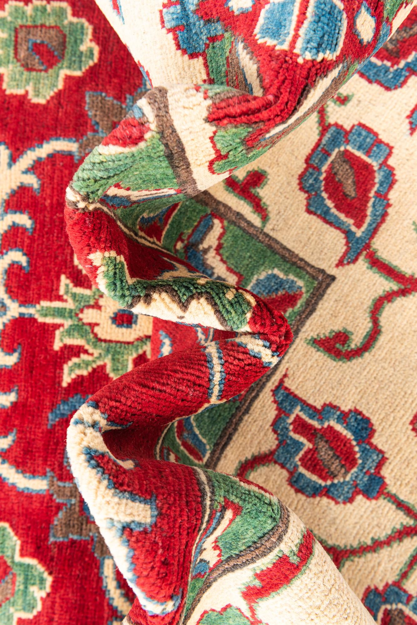 5' 7 x 8' Hand Knotted Kazak Rug