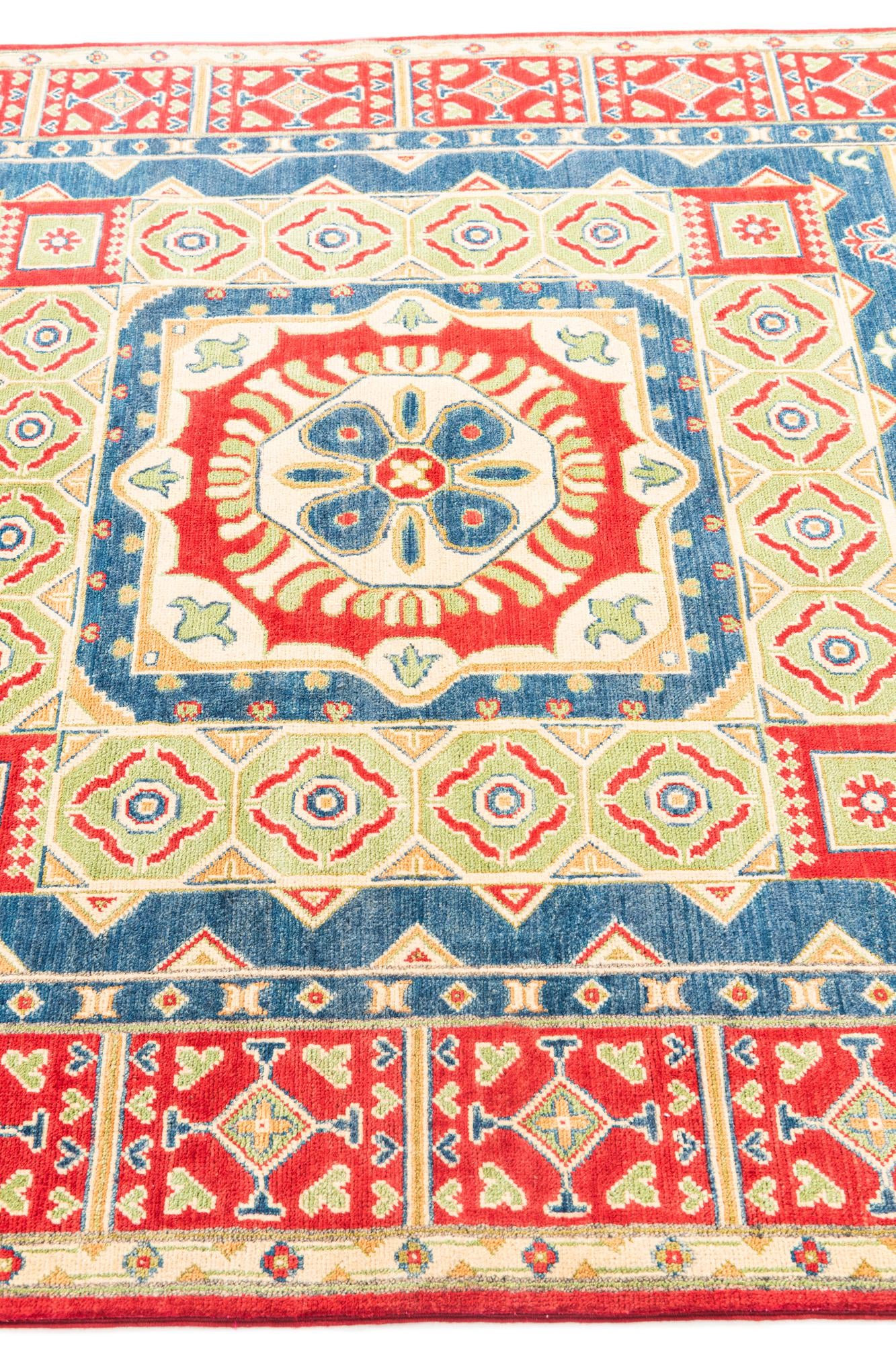 5' 5 x 8' Hand Knotted Kazak Rug