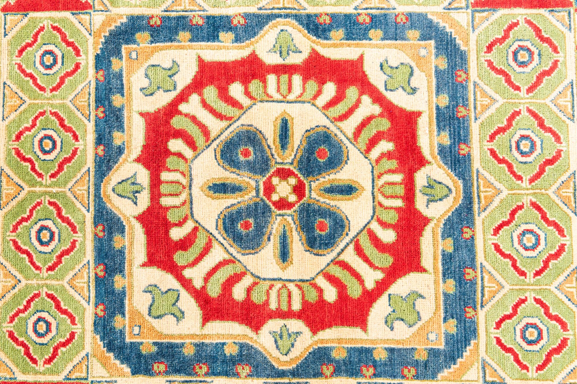 5' 5 x 8' Hand Knotted Kazak Rug