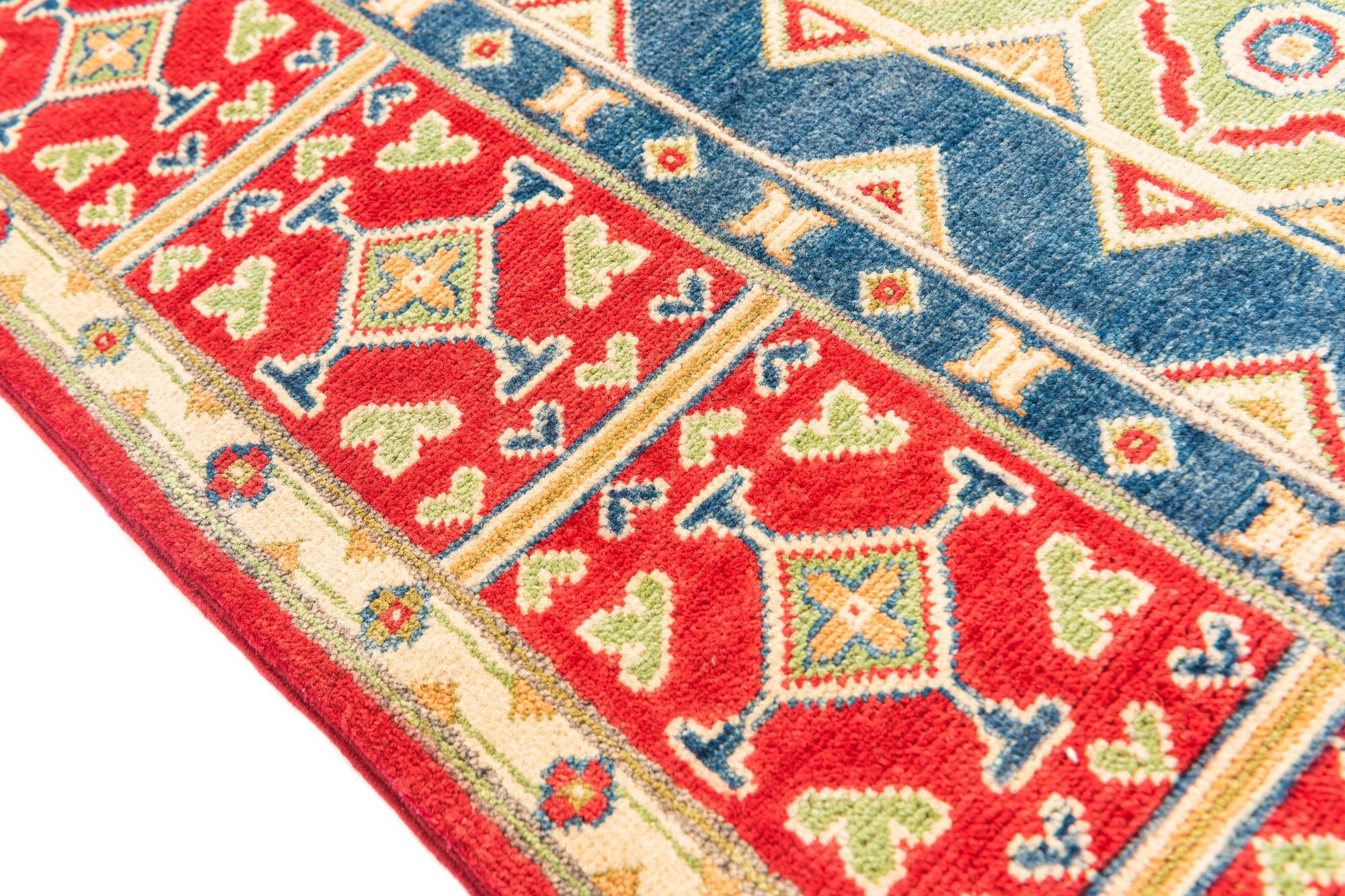 5' 5 x 8' Hand Knotted Kazak Rug