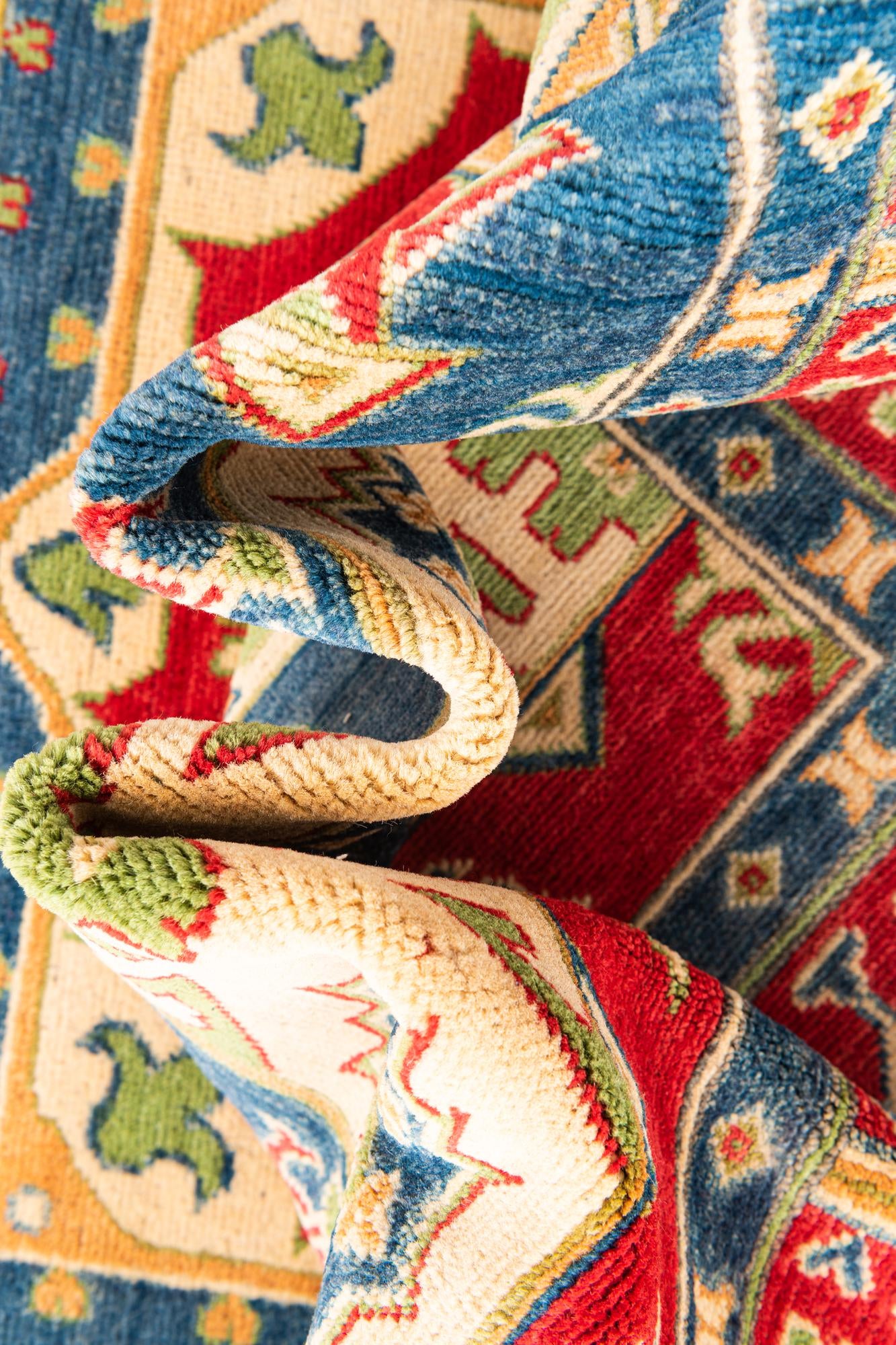 5' 5 x 8' Hand Knotted Kazak Rug
