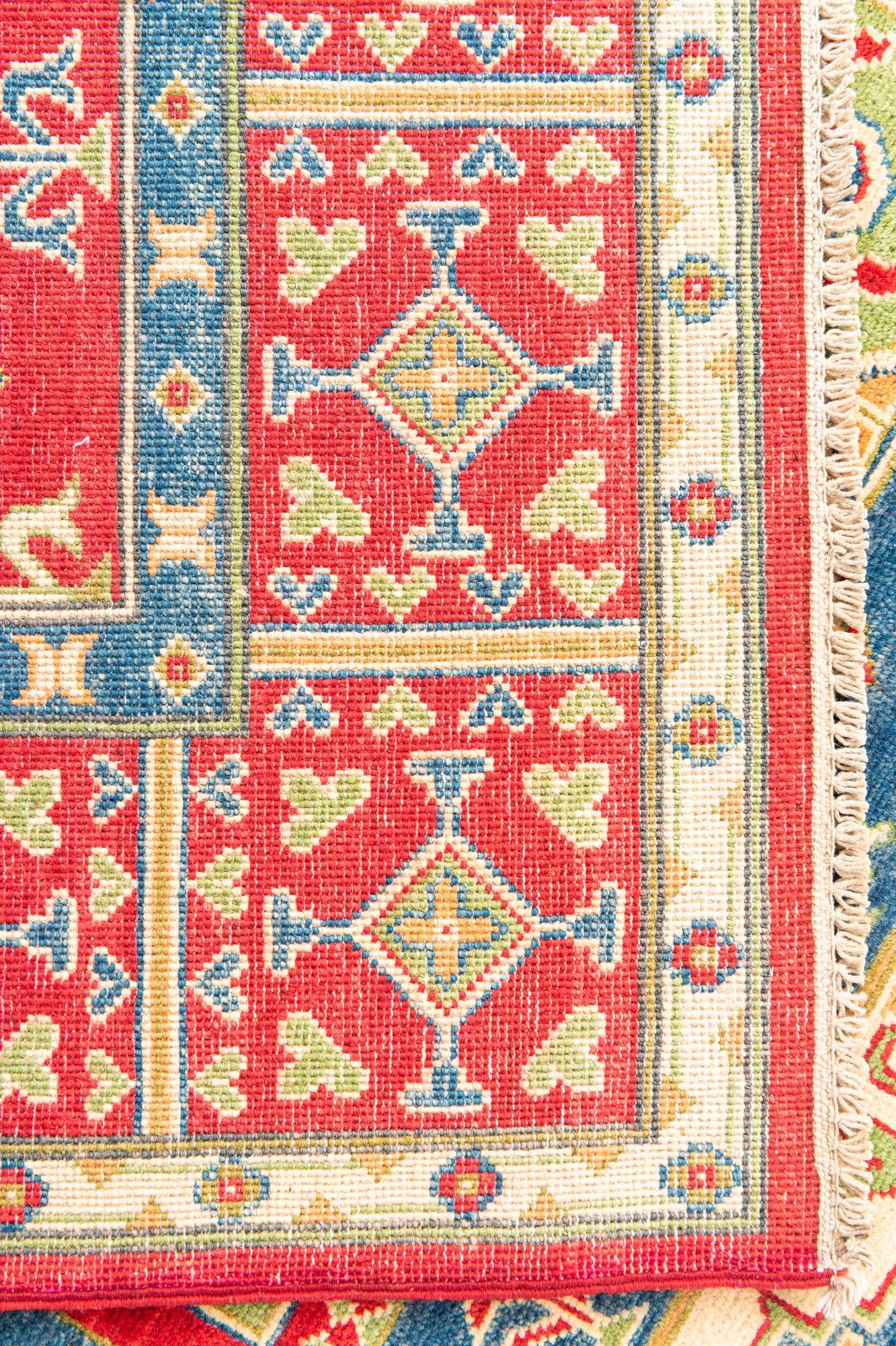 5' 5 x 8' Hand Knotted Kazak Rug