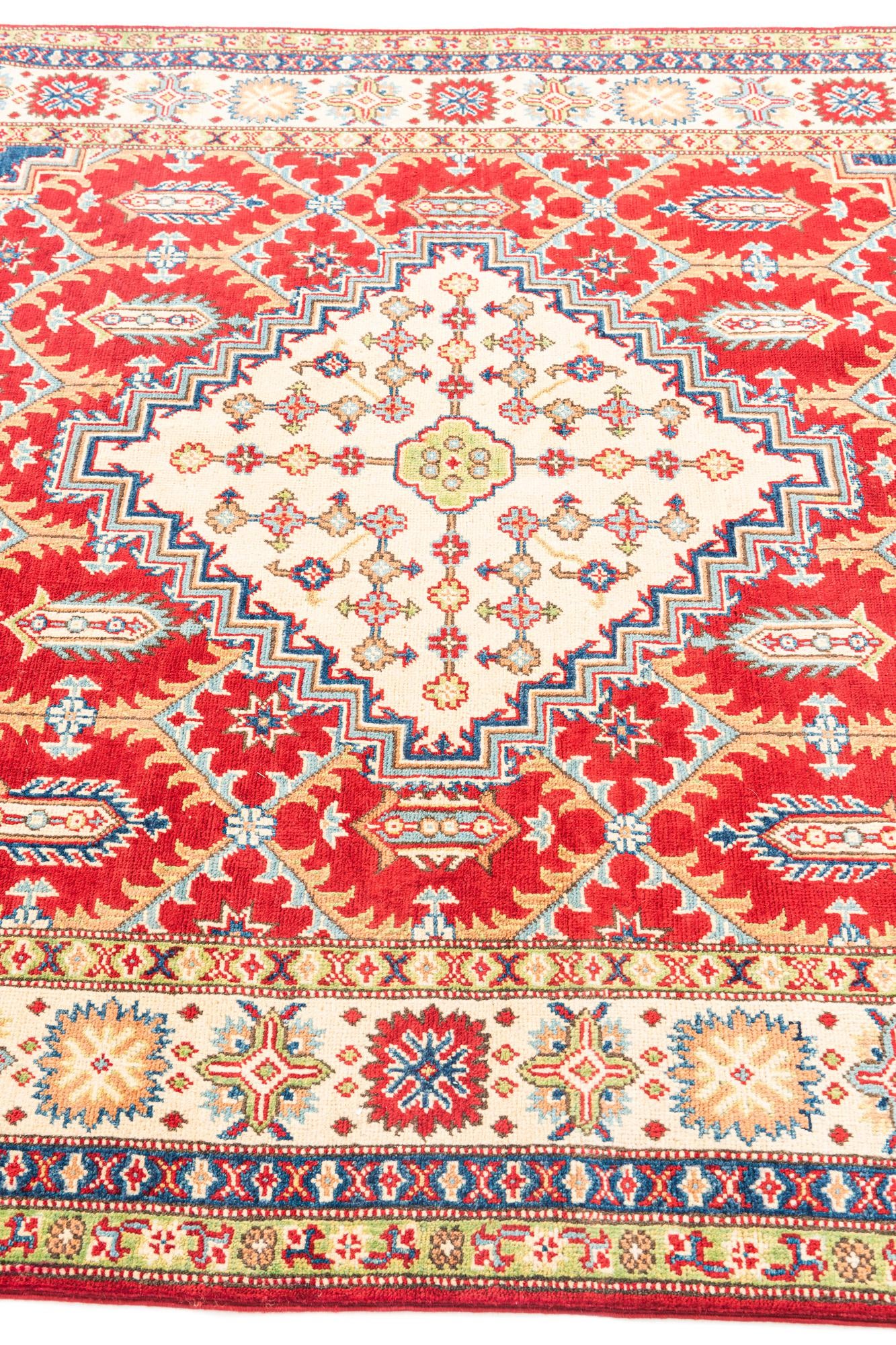 5' 7 x 8' Hand Knotted Kazak Rug