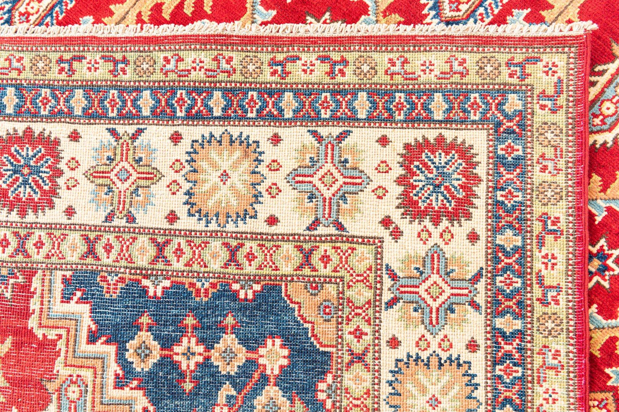 5' 7 x 8' Hand Knotted Kazak Rug
