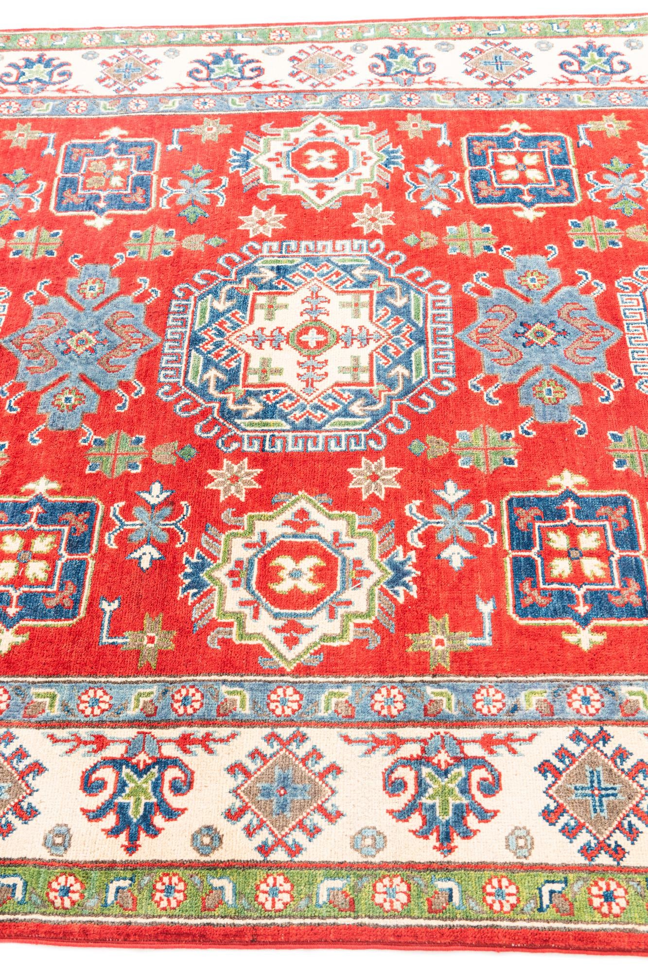 5' 5 x 8' Hand Knotted Kazak Rug