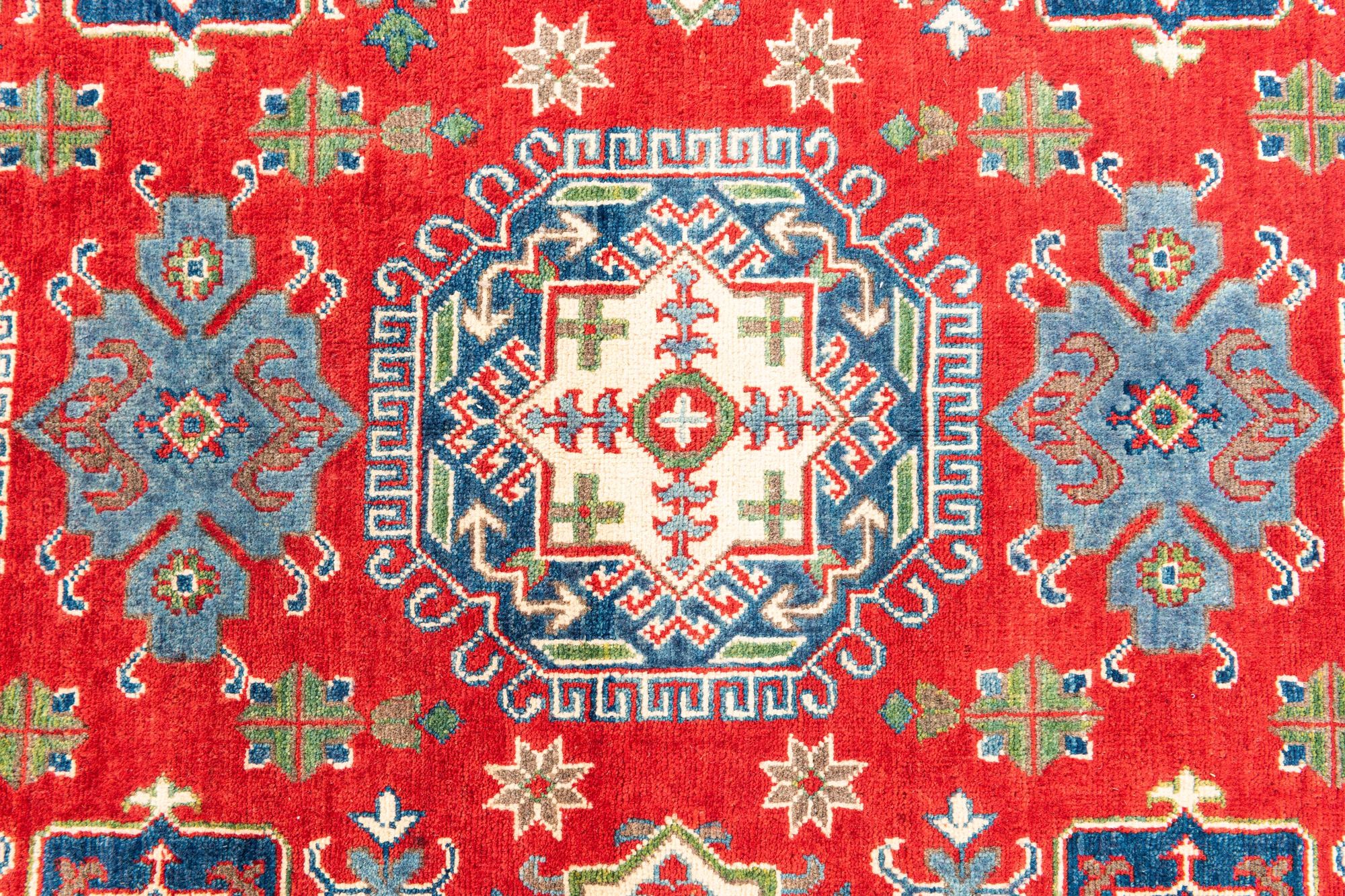 5' 5 x 8' Hand Knotted Kazak Rug