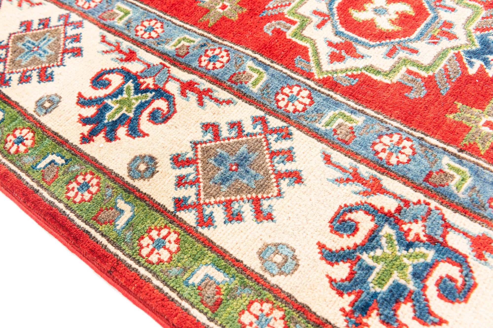 5' 5 x 8' Hand Knotted Kazak Rug