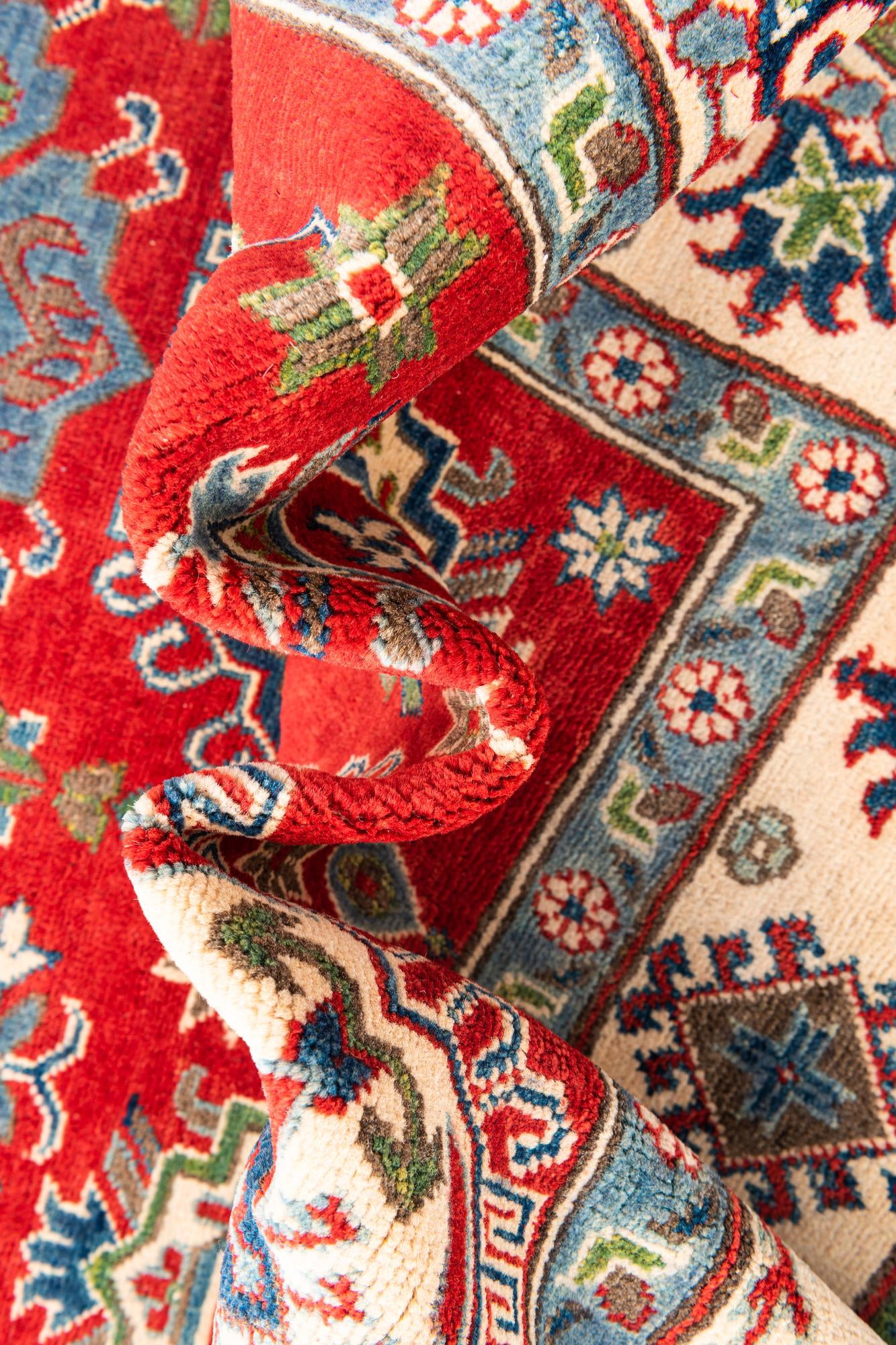 5' 5 x 8' Hand Knotted Kazak Rug