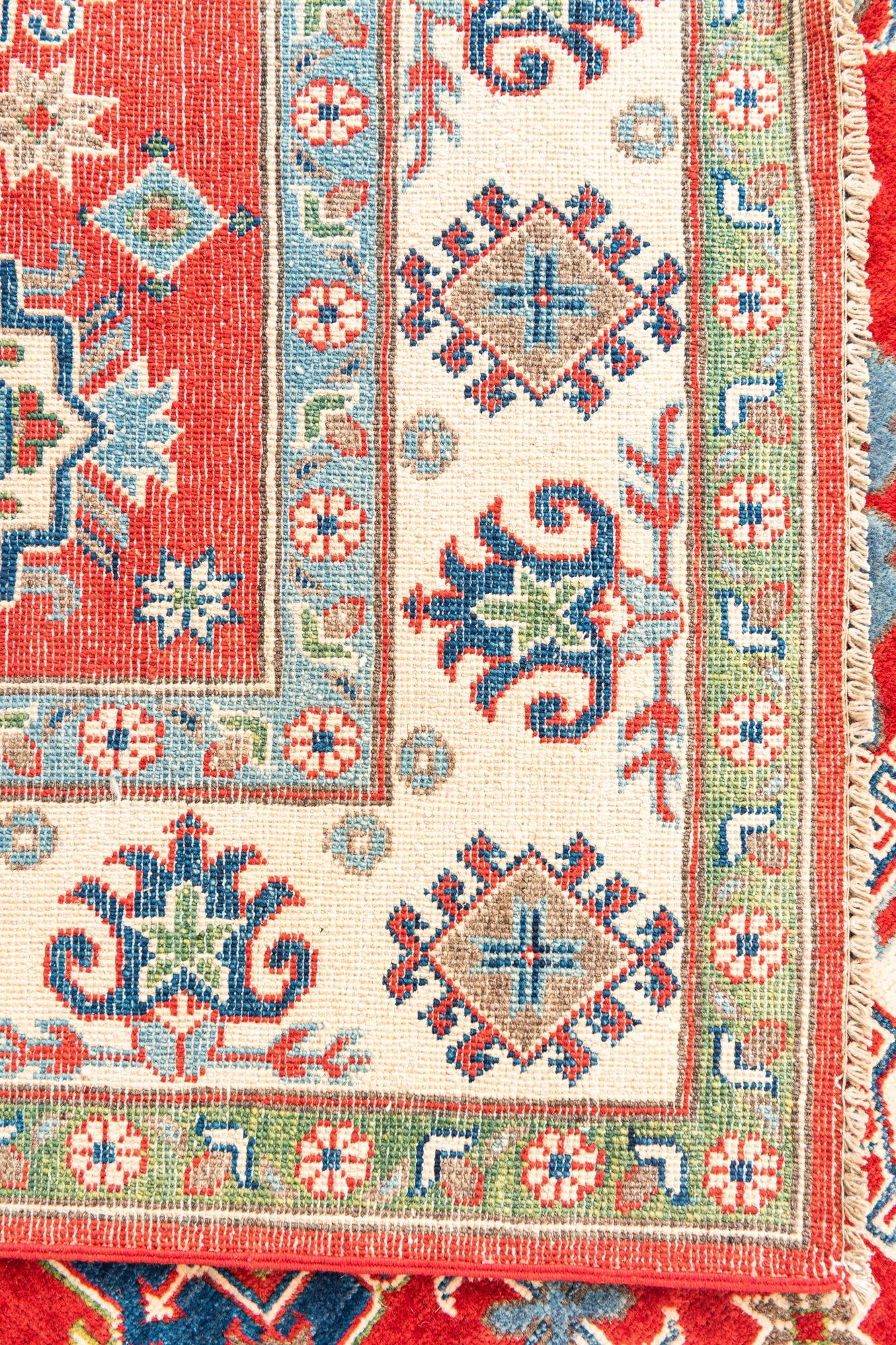 5' 5 x 8' Hand Knotted Kazak Rug
