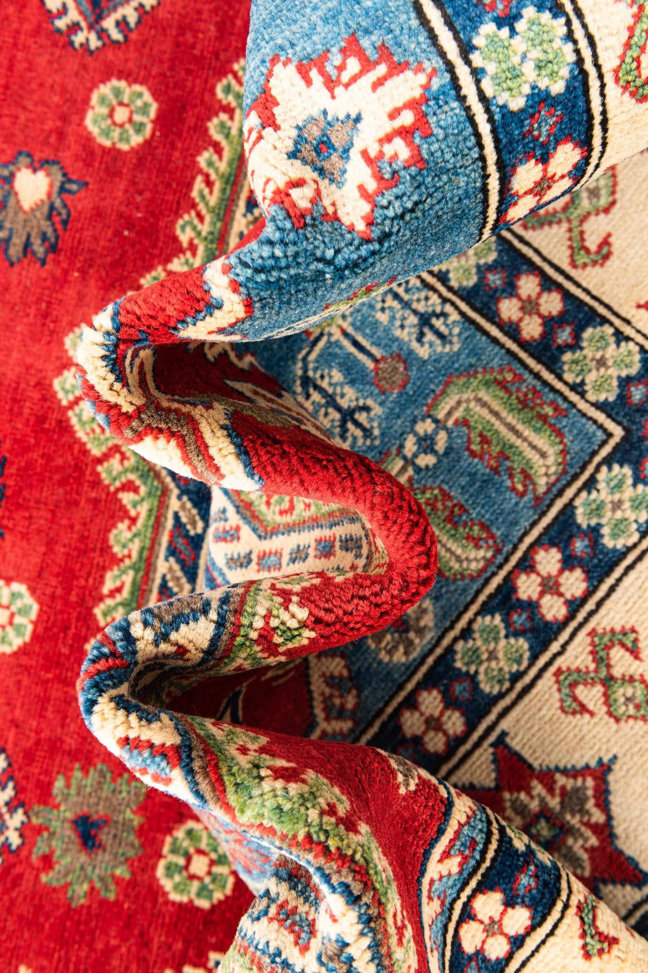 5' 7 x 7' 9 Hand Knotted Kazak Rug