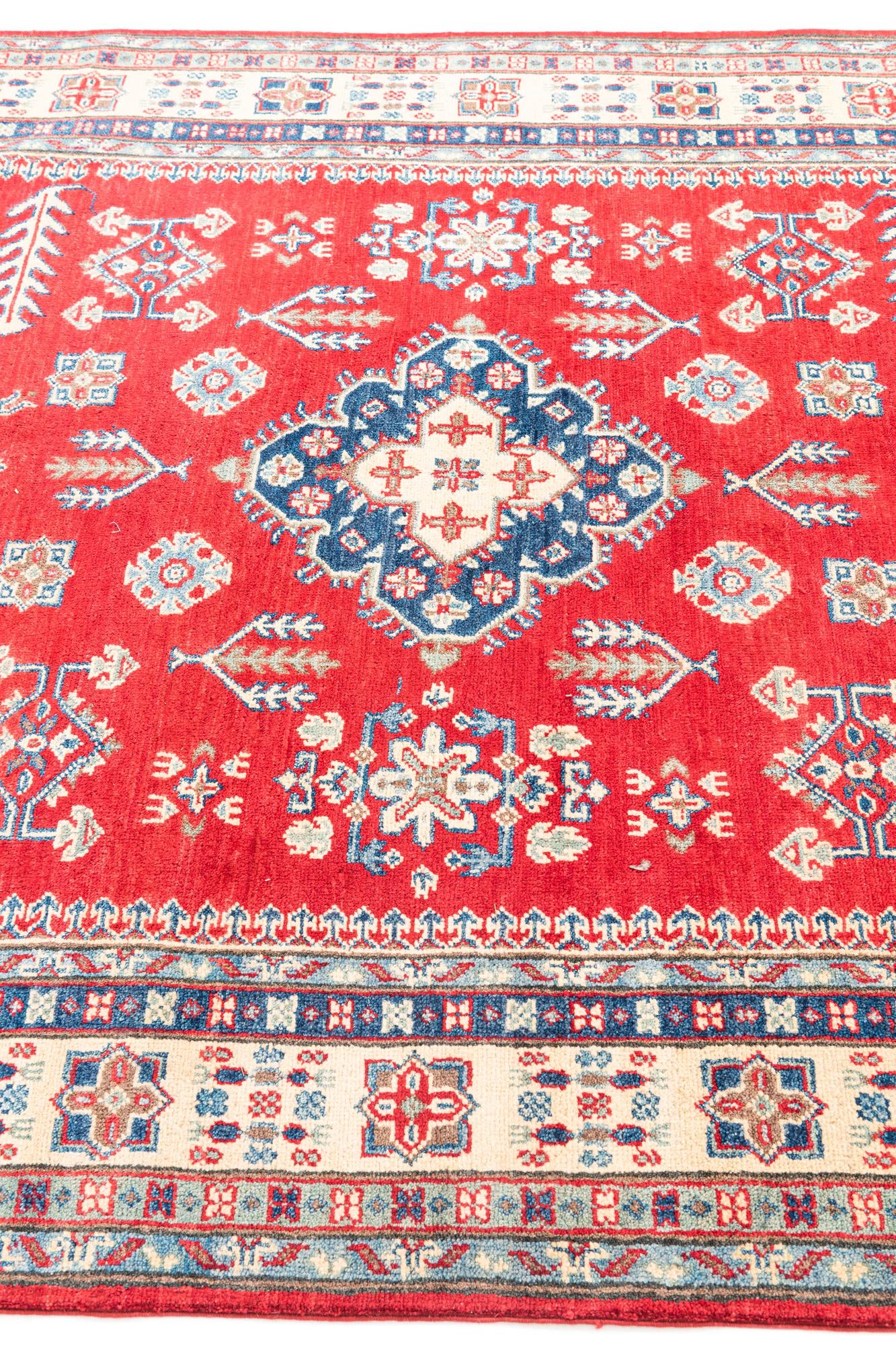 5' 6 x 8' Hand Knotted Kazak Rug