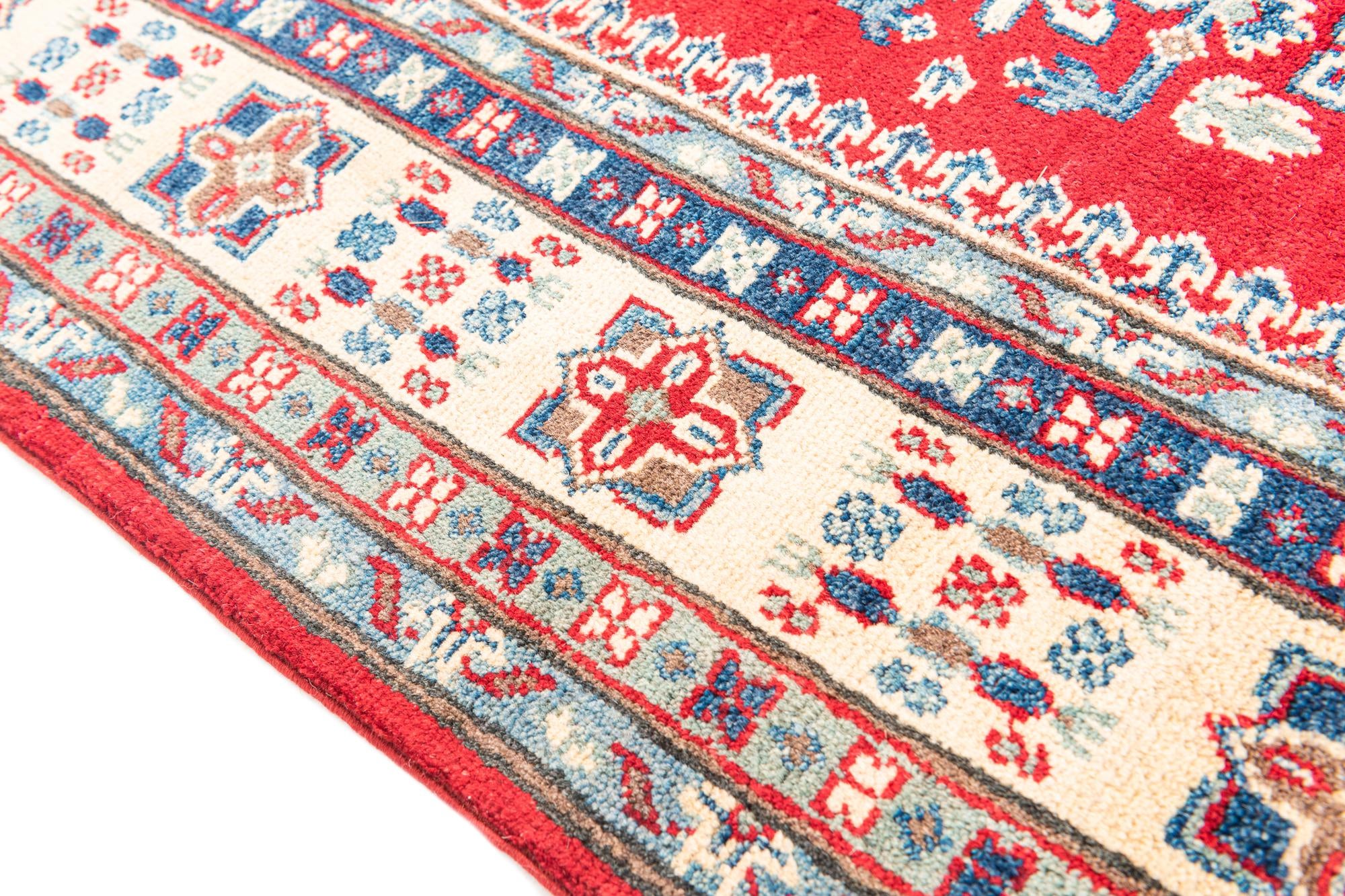 5' 6 x 8' Hand Knotted Kazak Rug