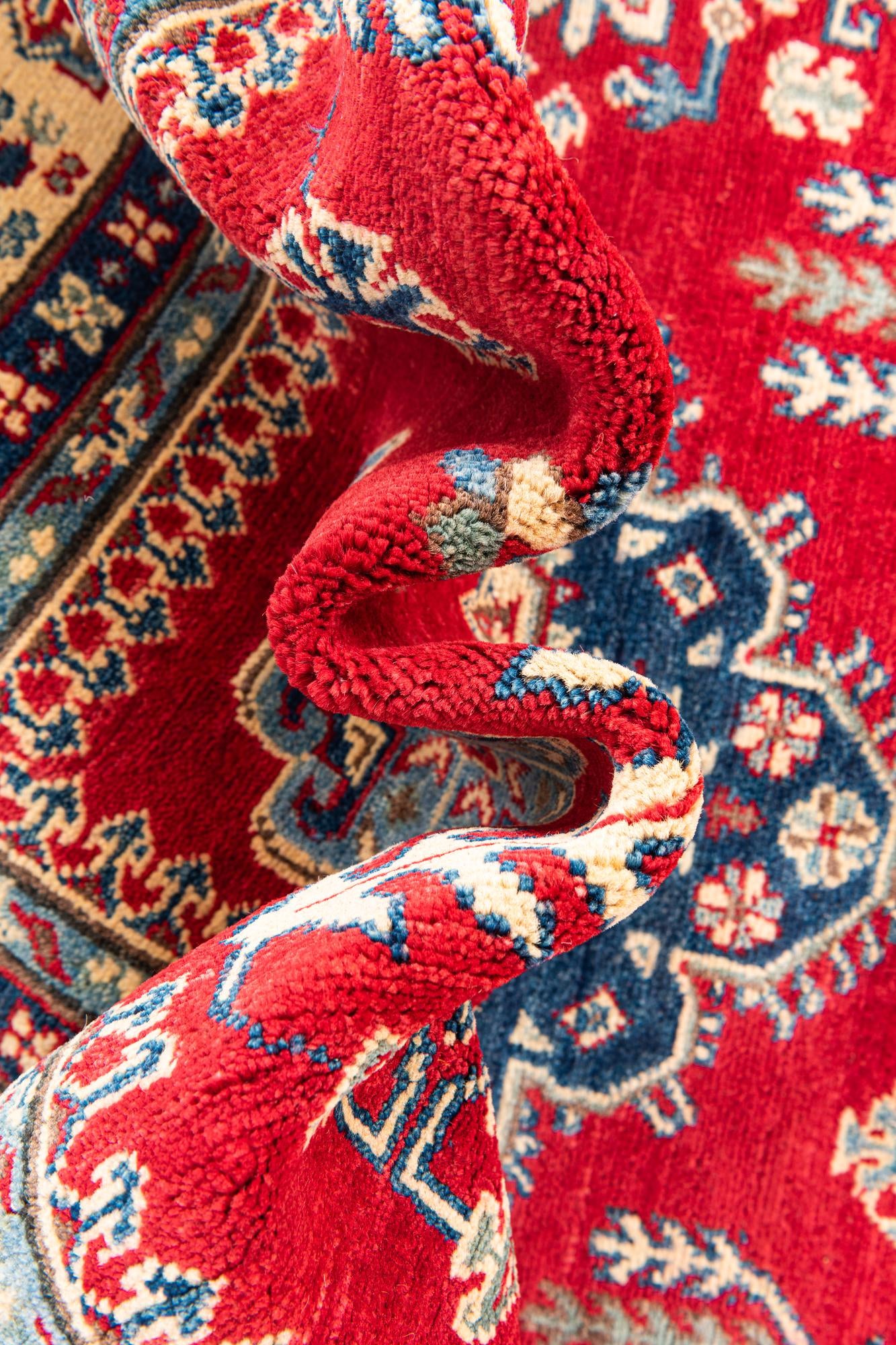 5' 6 x 8' Hand Knotted Kazak Rug