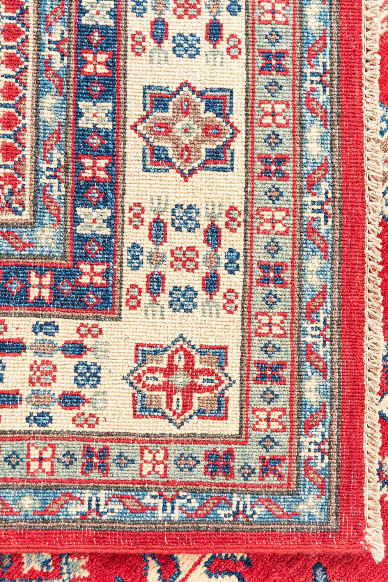 5' 6 x 8' Hand Knotted Kazak Rug