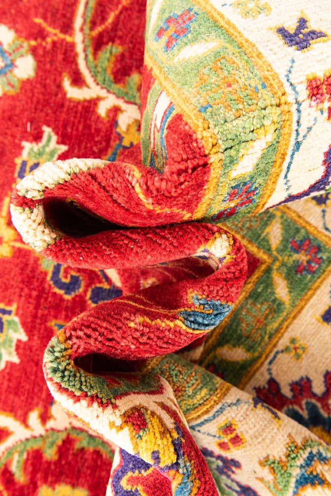 6' x 9' 1 Hand Knotted Kazak Rug