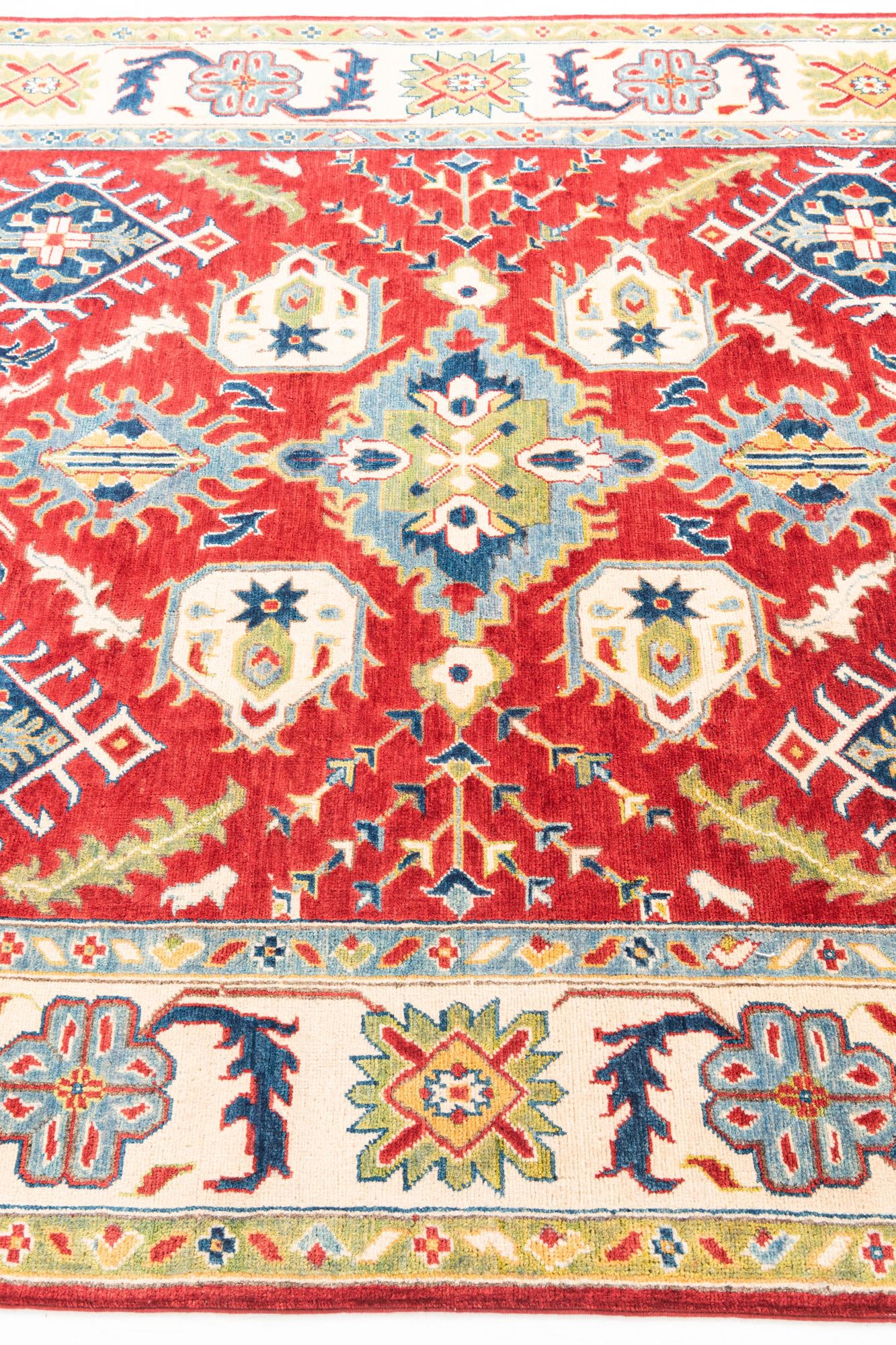 6' x 9' 5 Hand Knotted Kazak Rug