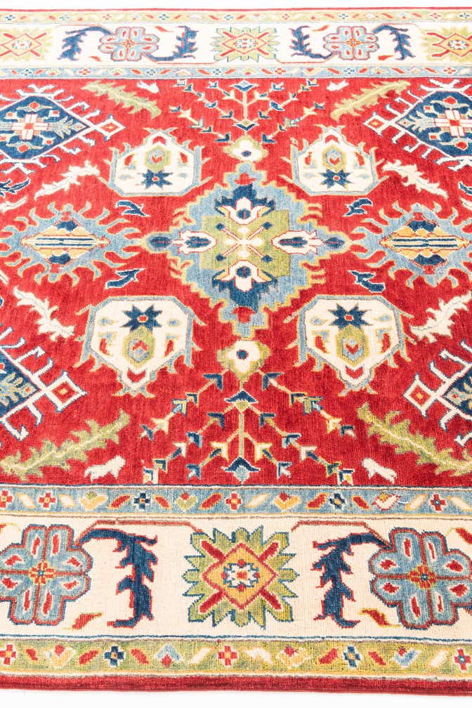 6' x 9' 5 Hand Knotted Kazak Rug