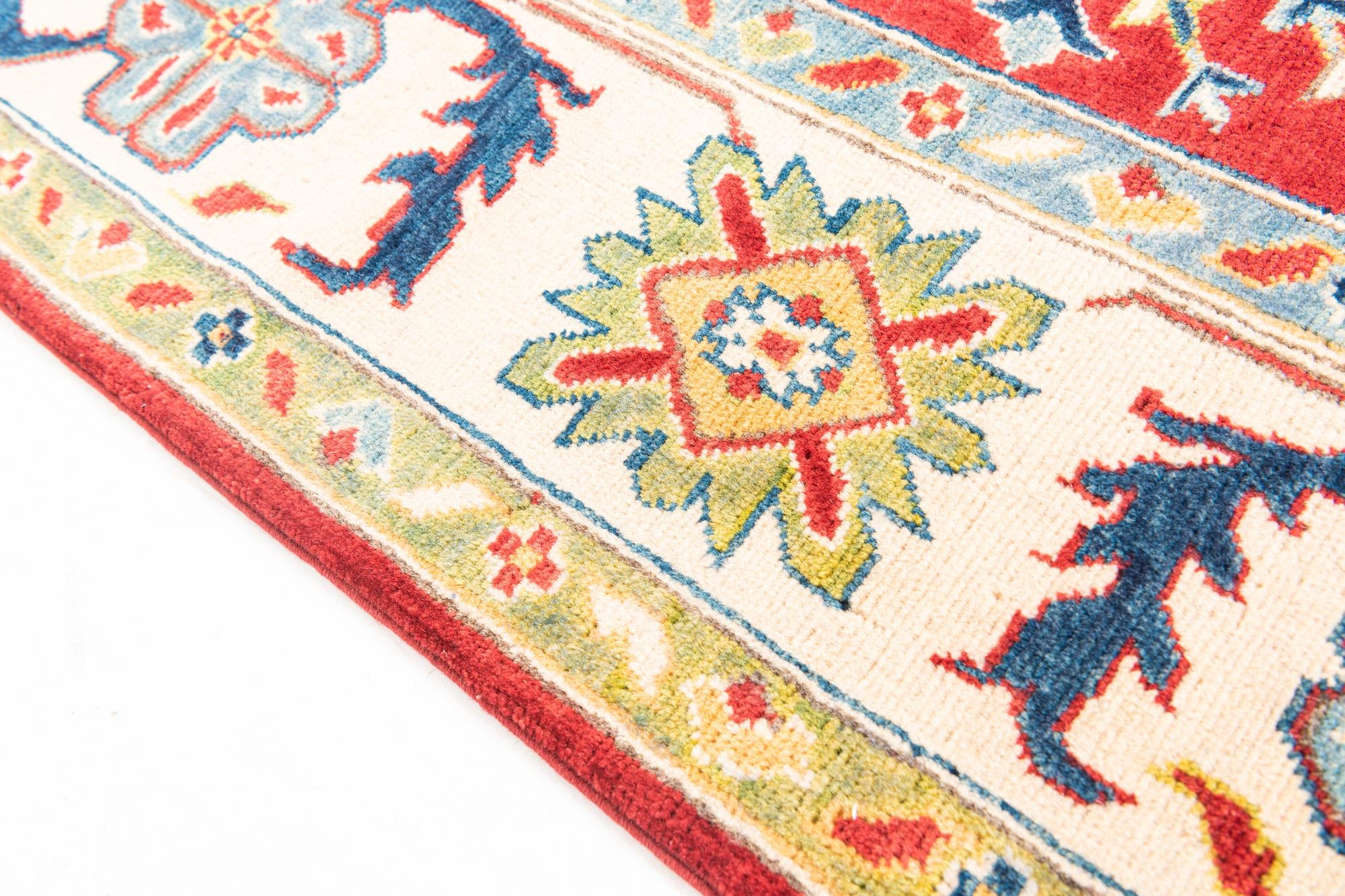 6' x 9' 5 Hand Knotted Kazak Rug