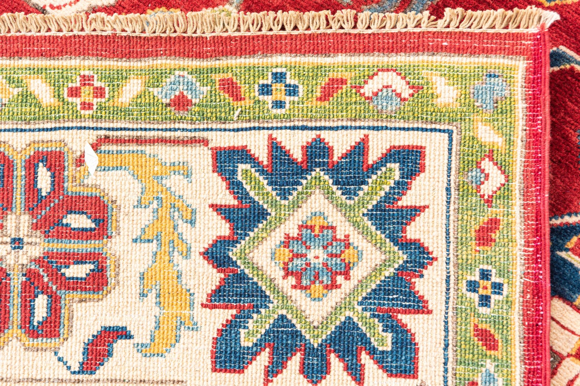 6' x 9' 5 Hand Knotted Kazak Rug