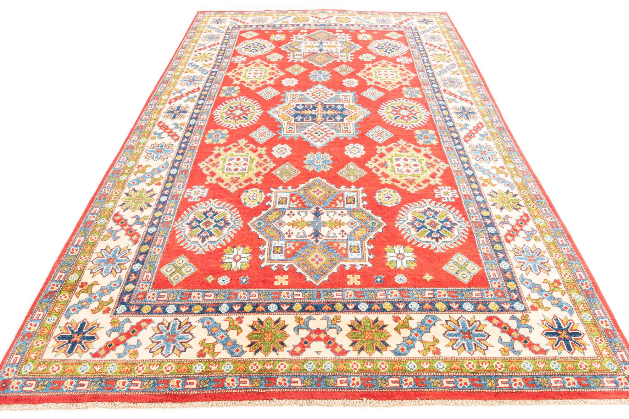 6' x 9' 8 Hand Knotted Kazak Rug
