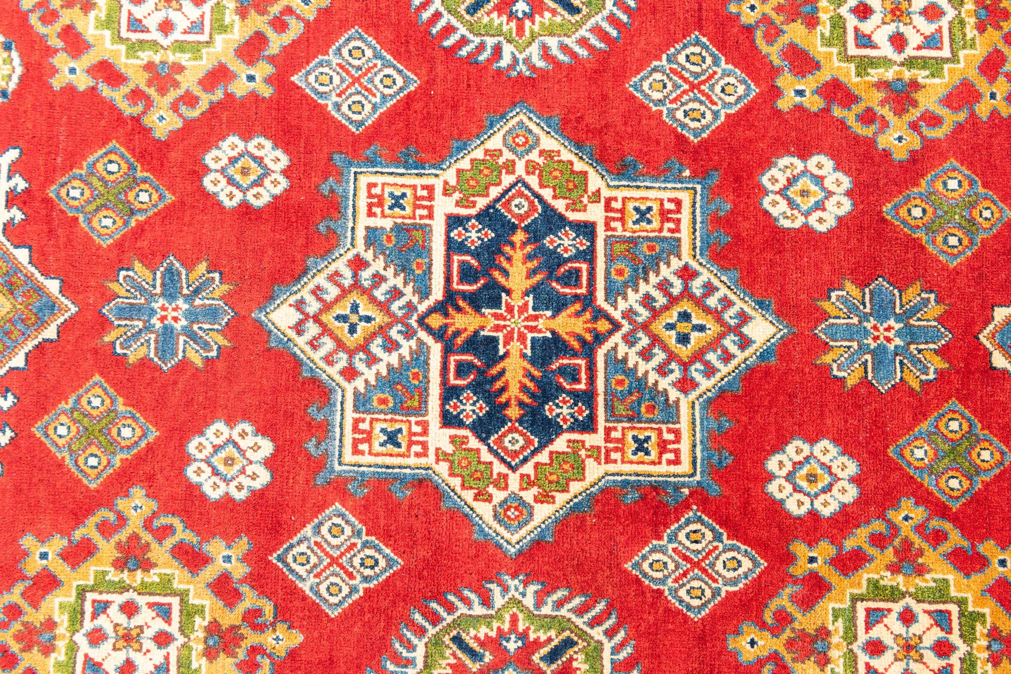 6' x 9' 8 Hand Knotted Kazak Rug