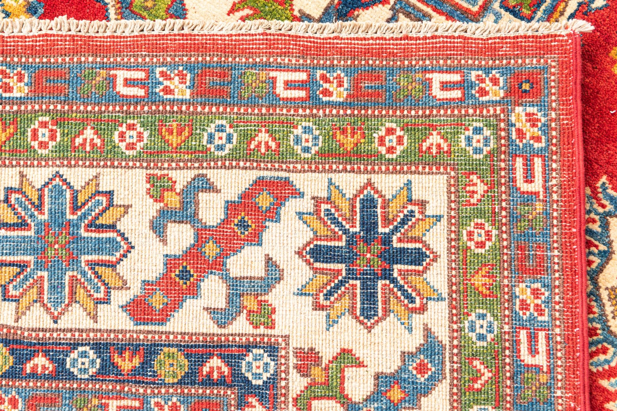 6' x 9' 8 Hand Knotted Kazak Rug