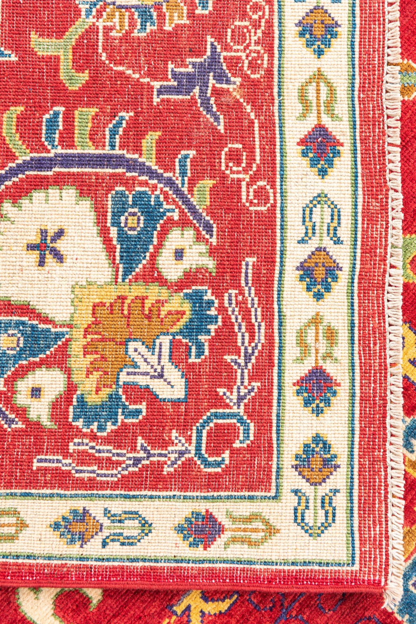 5' 10 x 9' 3 Hand Knotted Kazak Rug