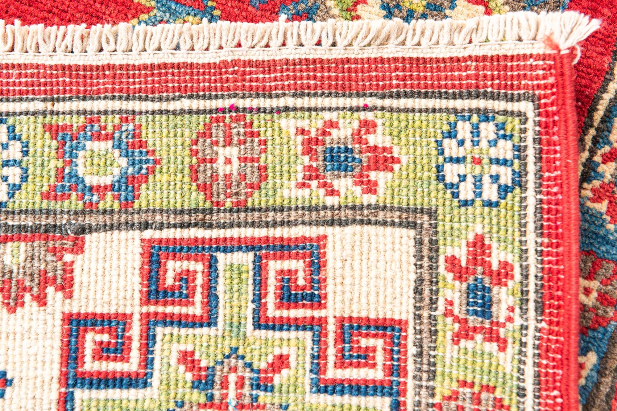 5' x 6' 9 Hand Knotted Kazak Rug