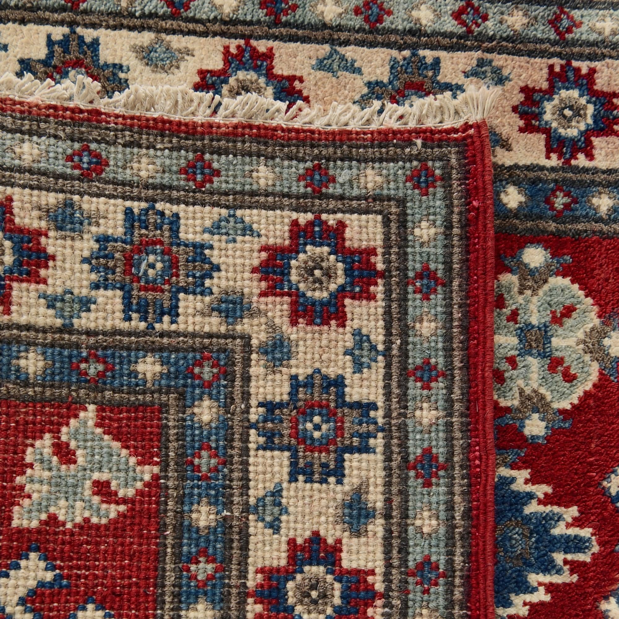55cm x 95cm Hand Knotted Kazak Rug