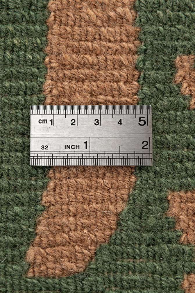5' 10 x 7' 9 Hand Knotted Tibet Wool Rug