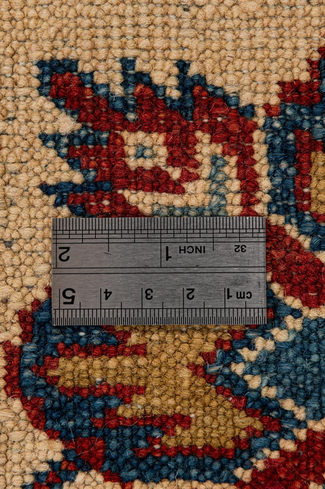 7' x 10' 7 Hand Knotted Kazak Wool Rug