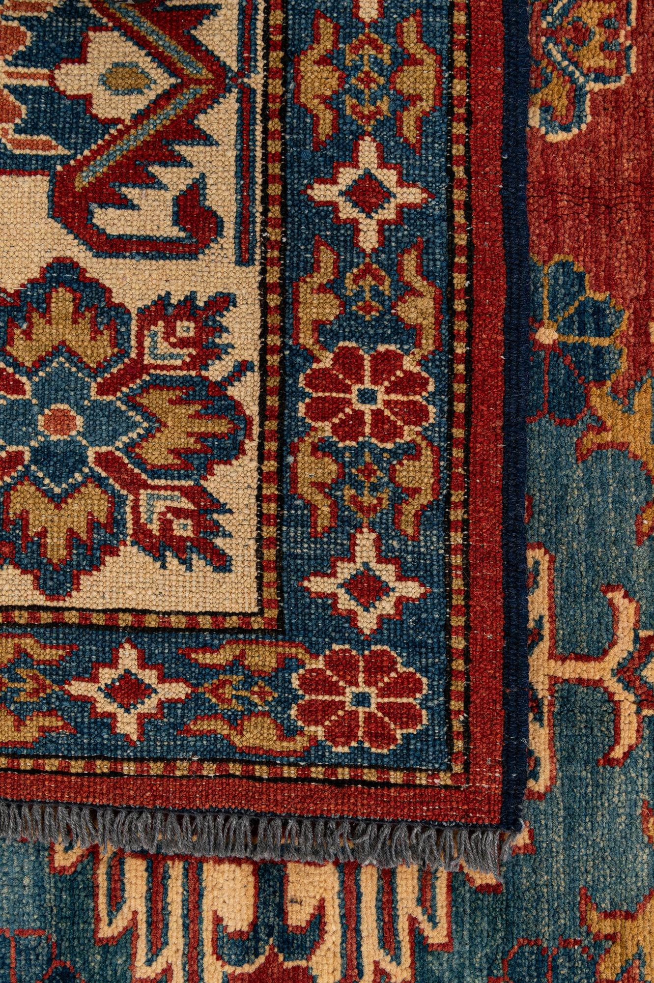 7' x 10' 7 Hand Knotted Kazak Wool Rug