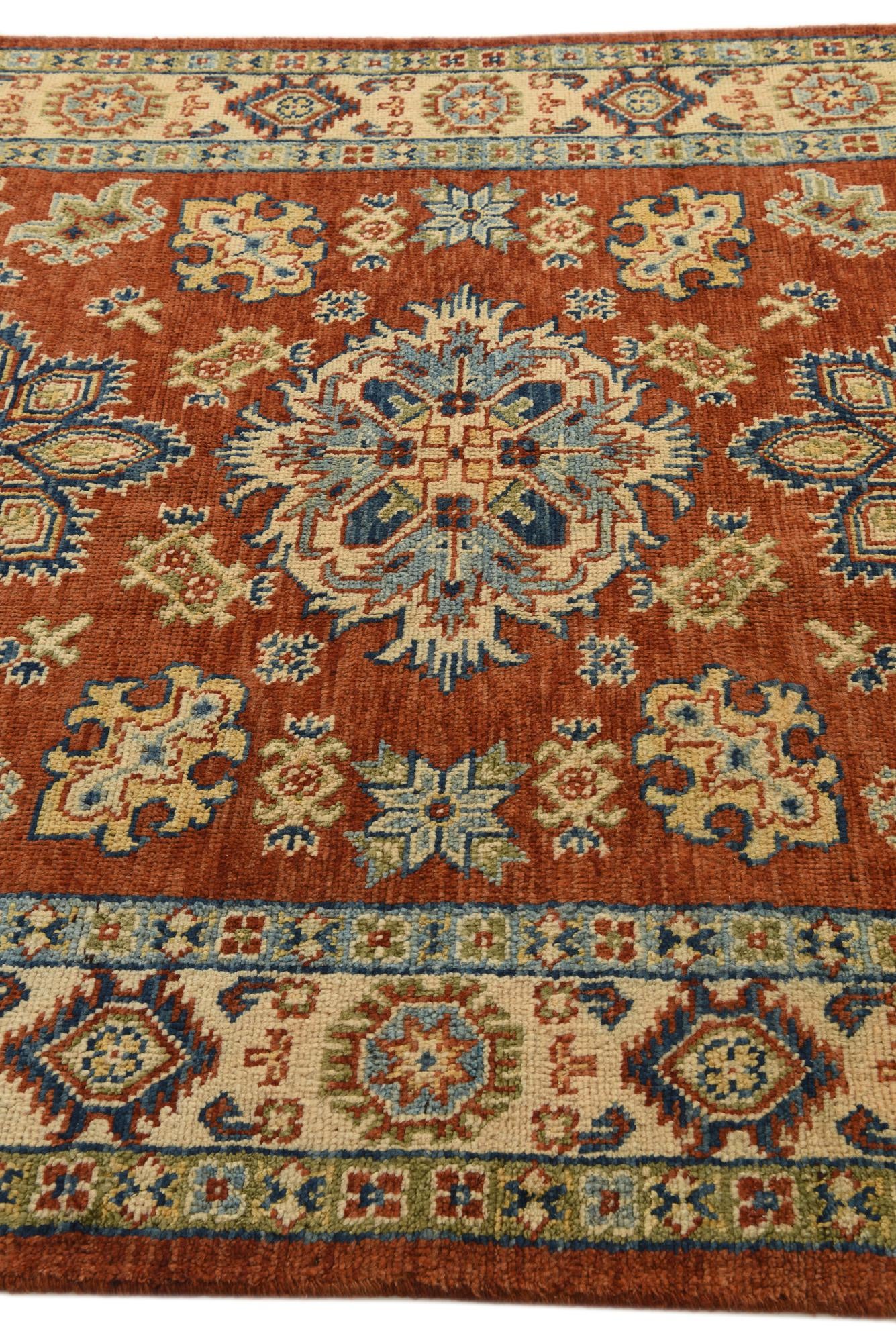 6' x 8' 3 Hand Knotted Kazak Rug