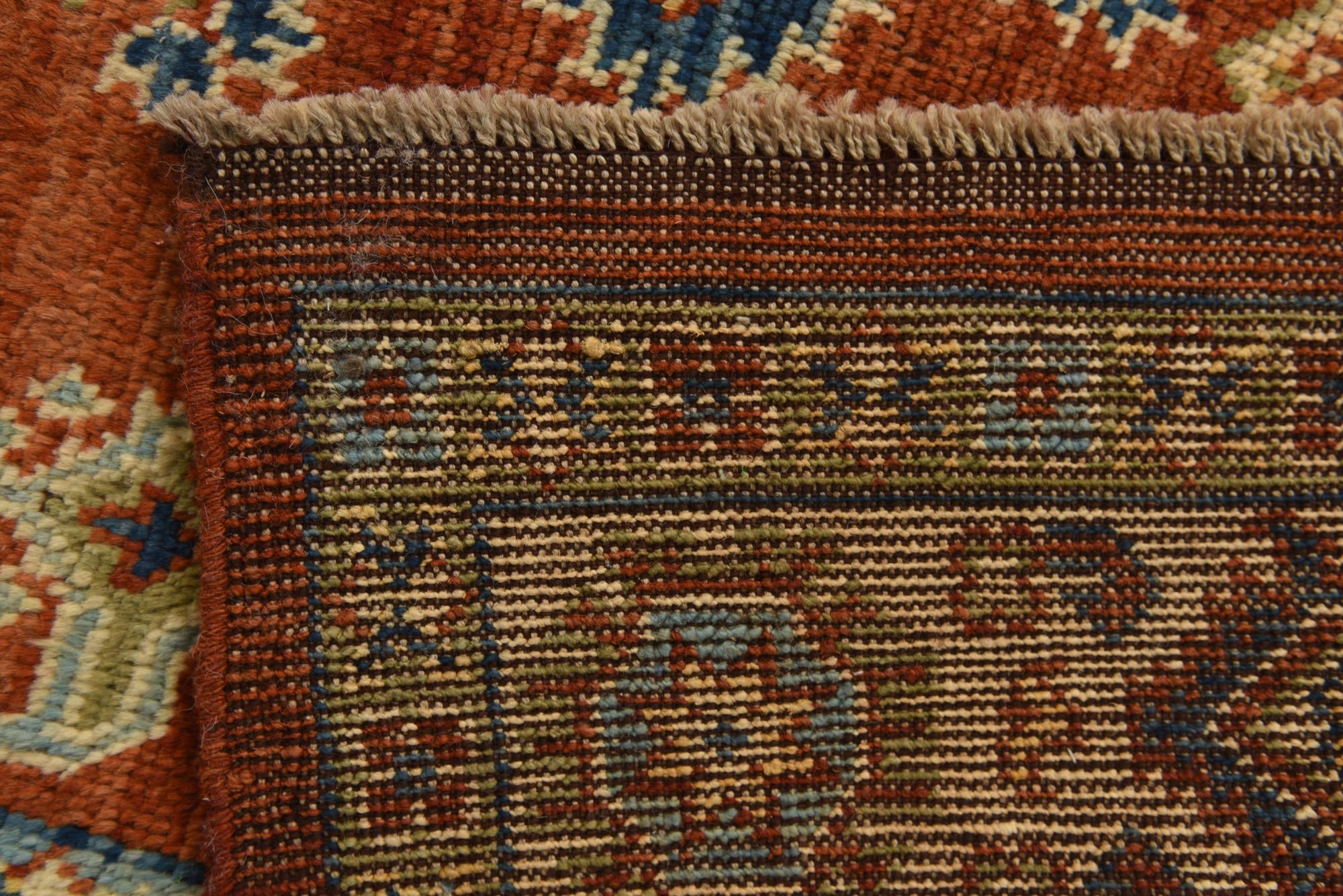 6' x 8' 3 Hand Knotted Kazak Rug