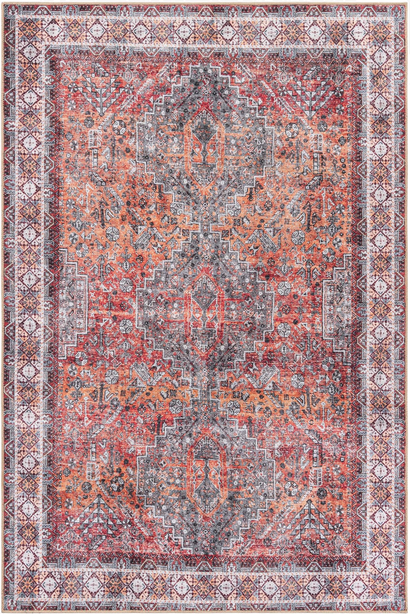 A 6x9 rectangular area rug featuring a distressed traditional pattern in shades of orange, red, and gray.