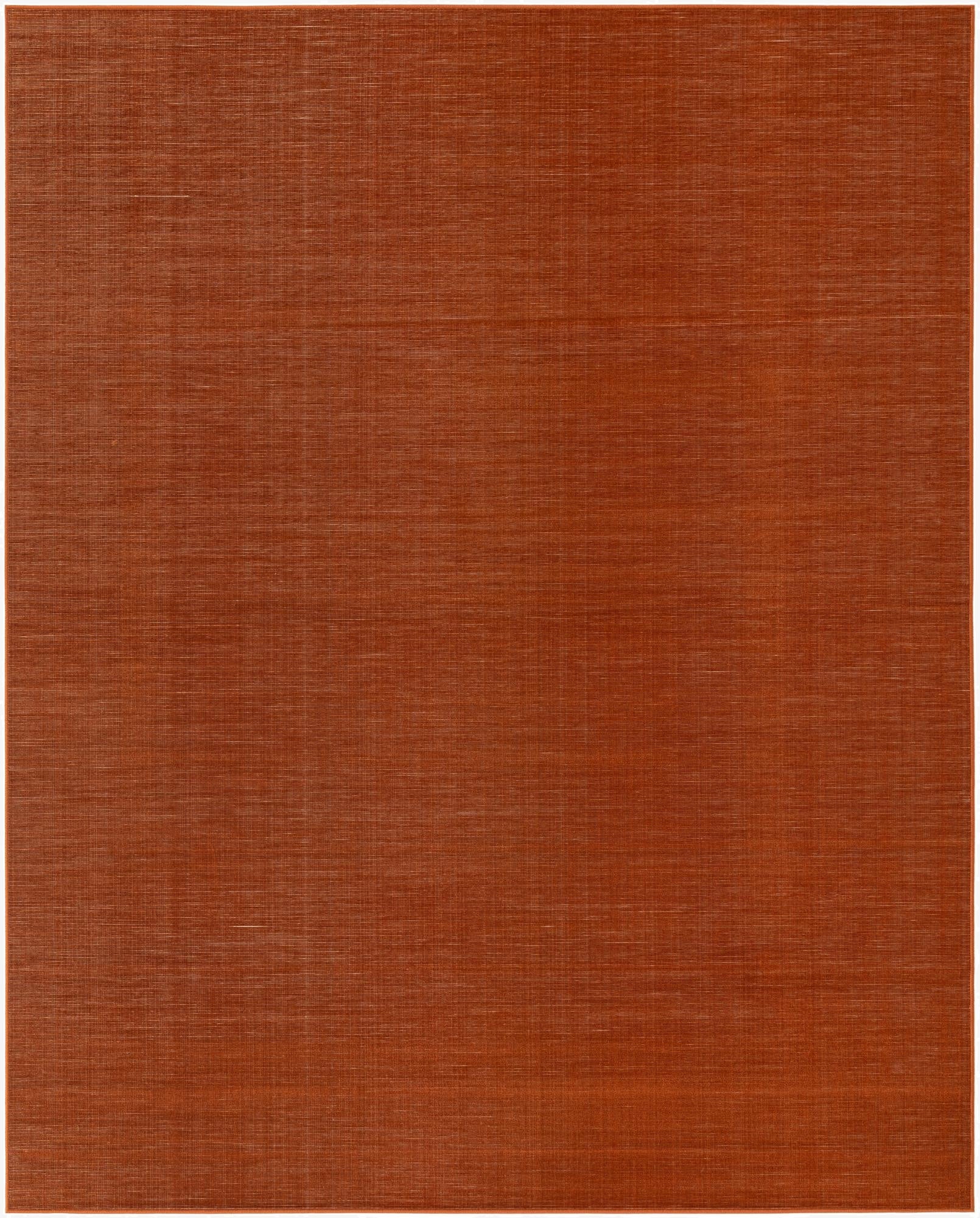 A large 8x10 rectangular SoHo Collection rug in a solid burnt orange color with a subtle flatweave texture.