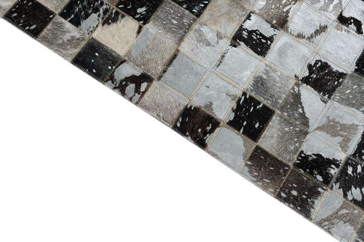 5' 1 x 8' 1 Cowhide Leather Rug