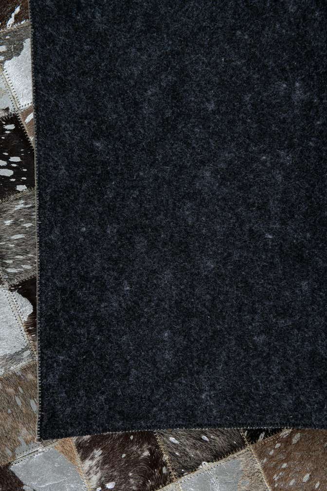 5' 1 x 8' 1 Cowhide Leather Rug